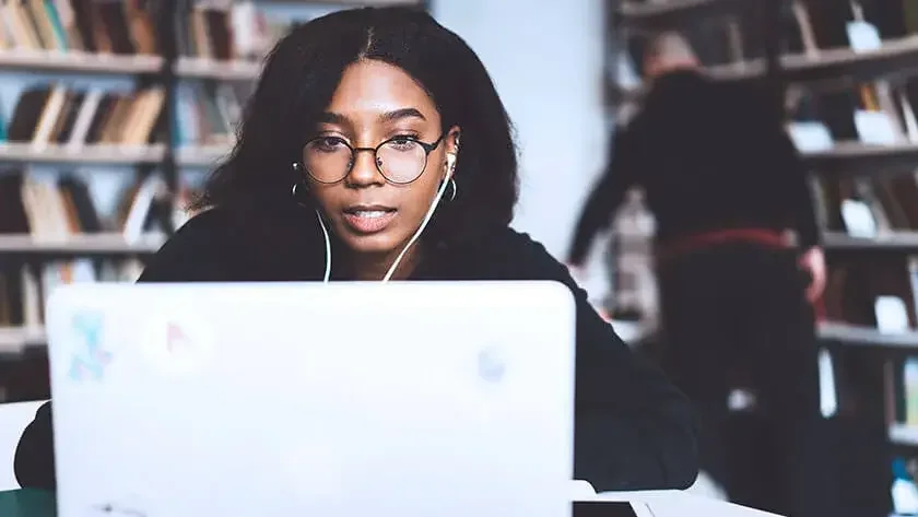 woman-looking-at-laptop working from home 