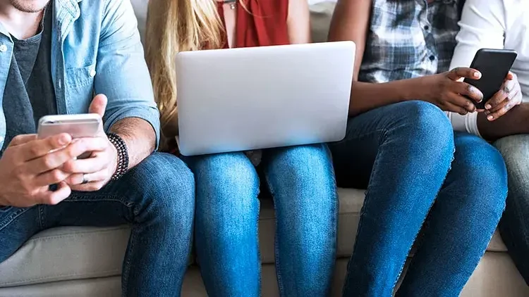 group-of-diverse-friends-using-digital-devices