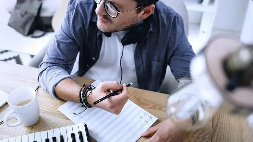 man composing music 