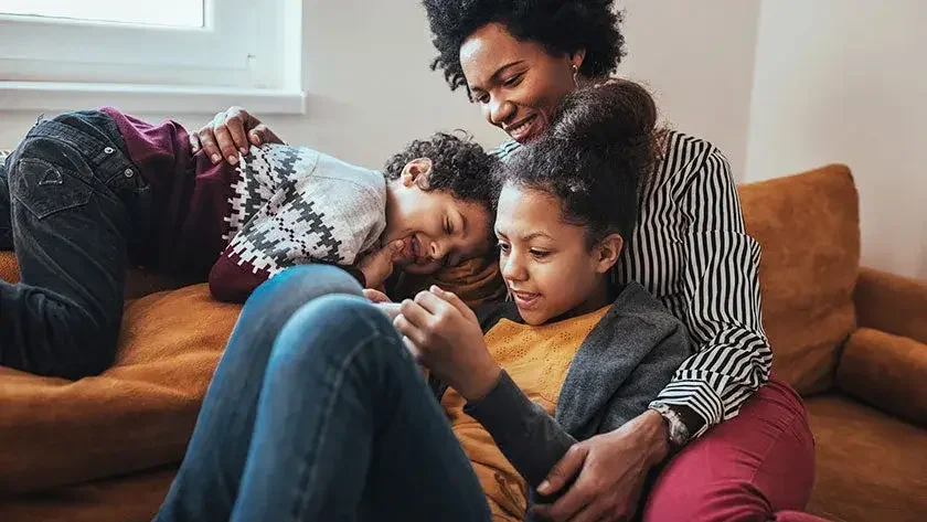 mom playing with kids at home 