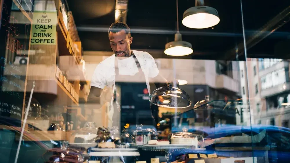 A coffee shop owner checks his inventory. He can qualify for a bad debt write off.