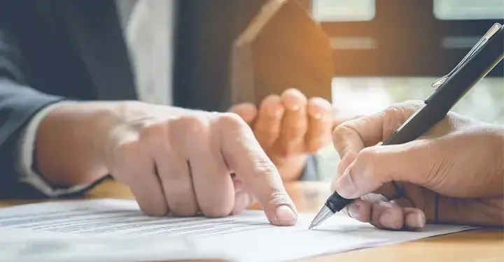people going over paperwork 