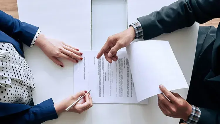 Woman signing official documents