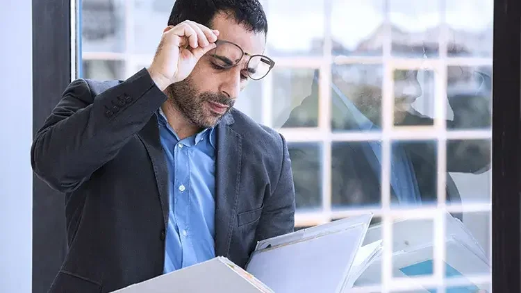 Man looking over documents