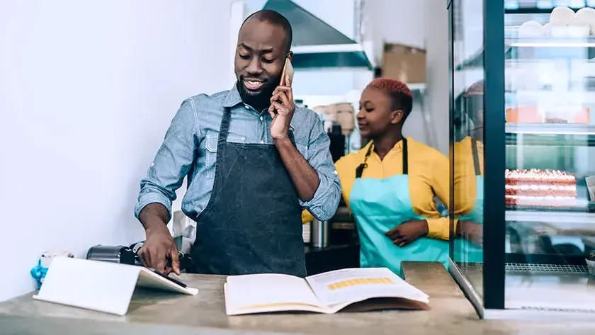 man-on-phone-working-in-bakery