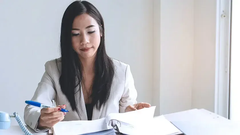 Woman reviewing documents