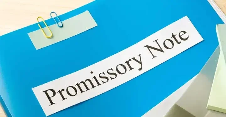 Folder with the words "Promissory Note" printed on the cover