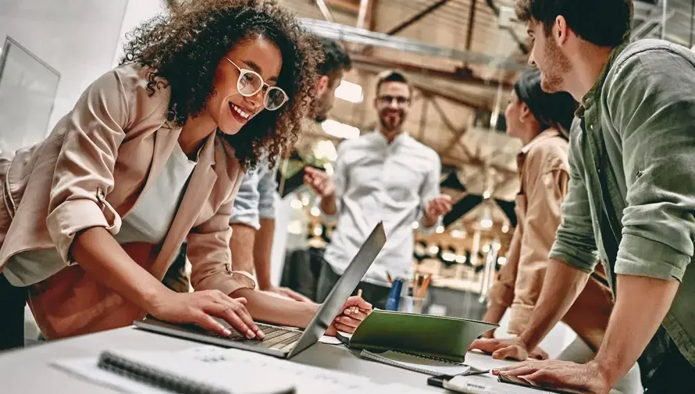 Business partners around a table to get ready to form a corporation.