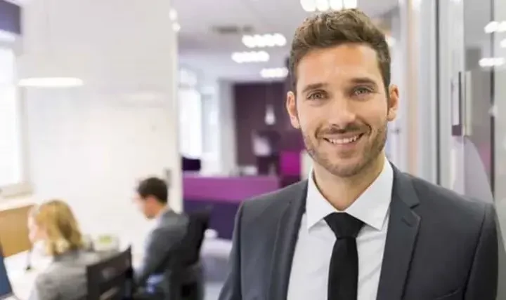 Business man smiling in the office