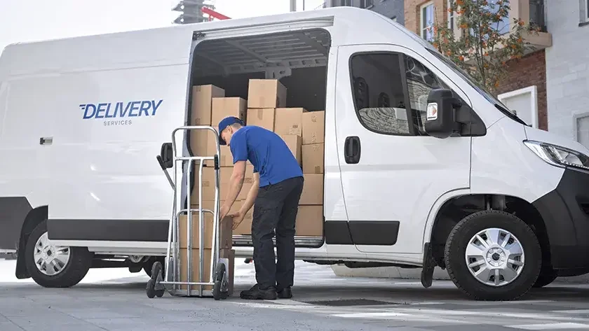 man loading up a delivery van