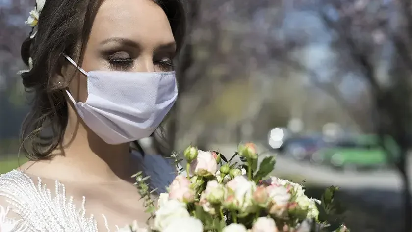 bride wearing face mask