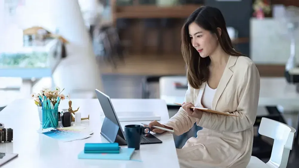 A young woman reads online about generation-skipping trusts, which transfer assets to younger generations.