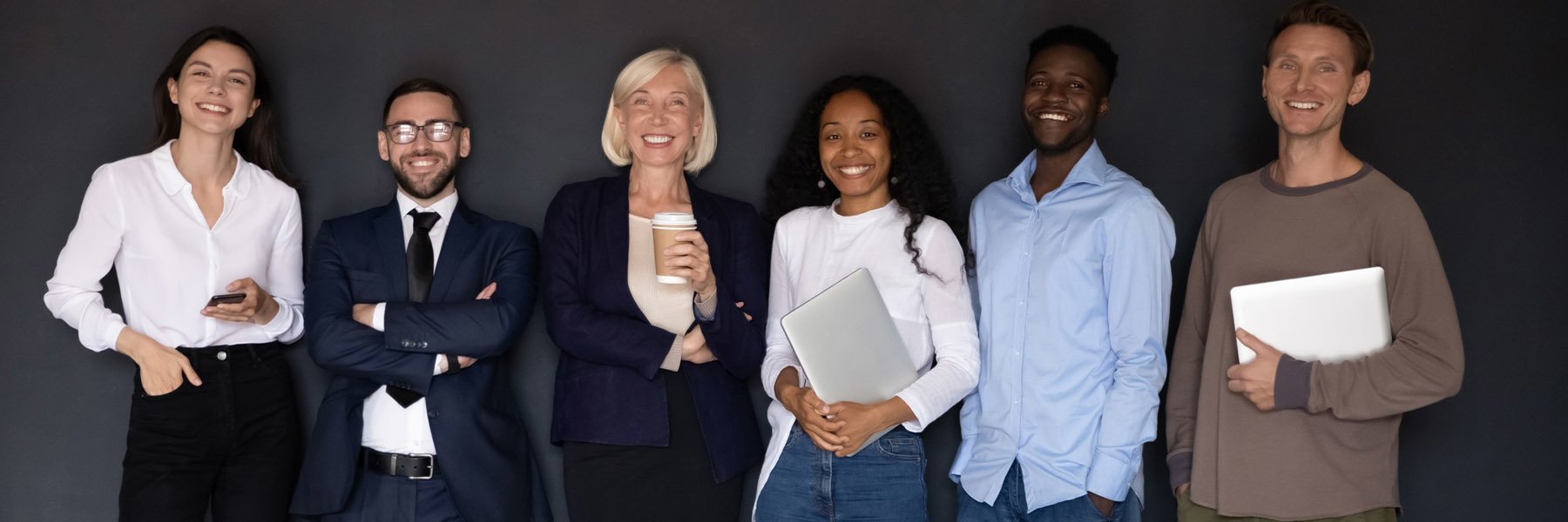 Cross Country Education color photo of a diverse group of five teachers.